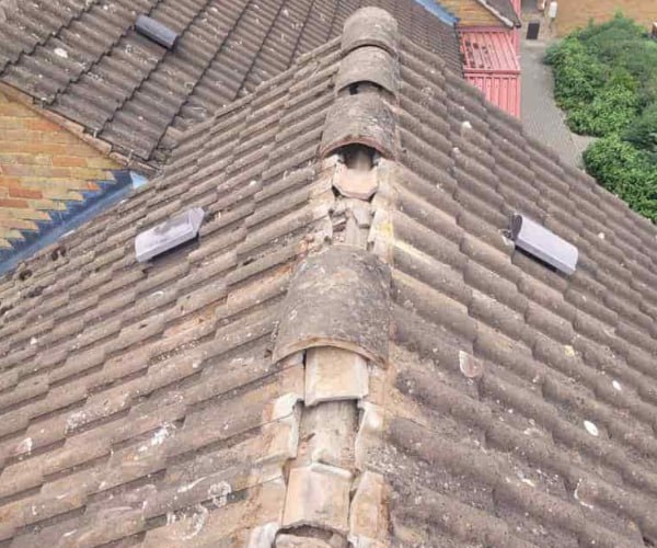 This is a photo if a roof ridge which has missing tiles. The ridge tiles are being replaced by SCG Roofing Earls Barton